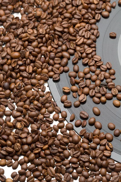 Coffee beans and vintage vinyl record — Stock Photo, Image