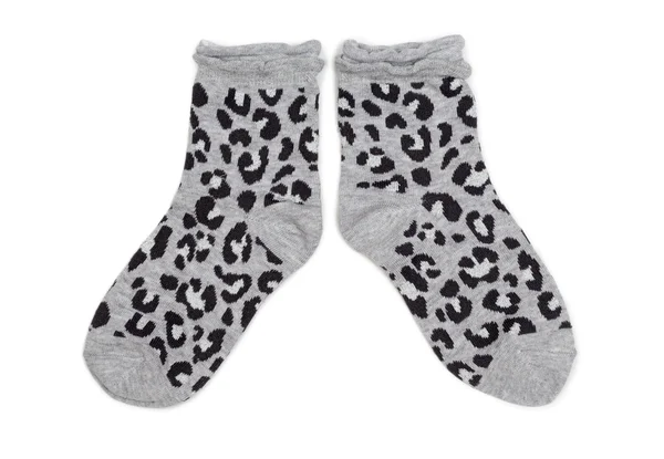 Paar graue Socken mit schwarzem Muster. — Stockfoto