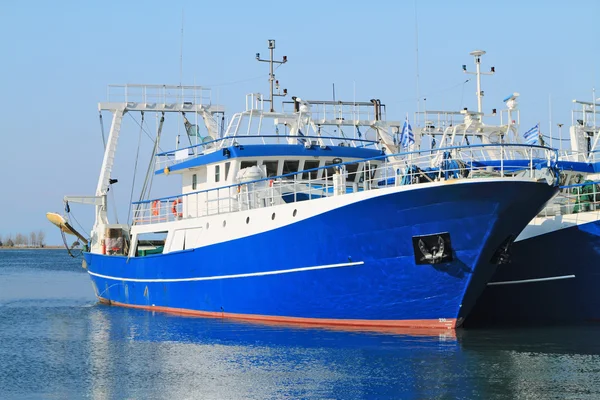 Fishing ships docked in port — Stock Photo, Image