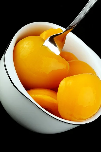 Canned peaches — Stock Photo, Image