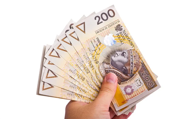 Вид руки, що тримає кілька польських двісті банкнот — стокове фото