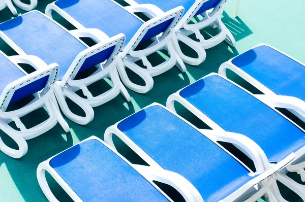 Close up view of blue deck chairs — Stock Photo, Image