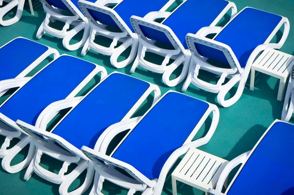 Close up view of blue deck chairs — Stock Photo, Image