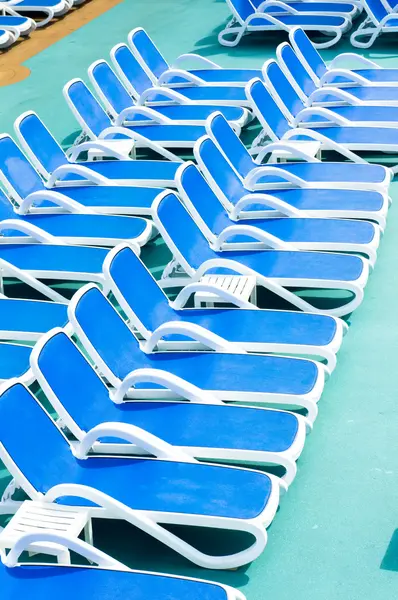 Close up view of blue deck chairs — Stock Photo, Image