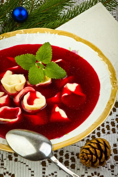 Traditional Christmas borscht with mushrooms filled in dumplings — Stock Photo, Image