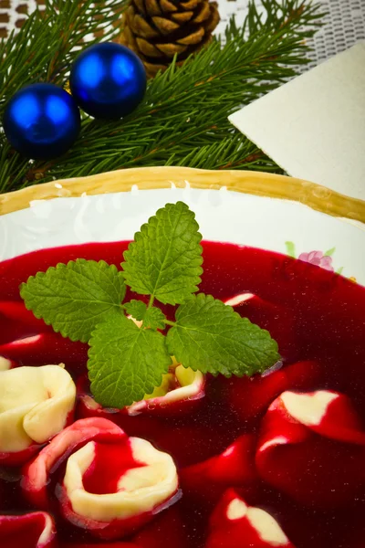 Traditional Christmas borscht with mushrooms filled in dumplings — Stock Photo, Image