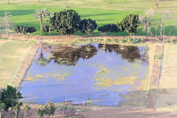 Campo de futebol inundado — Fotografia de Stock