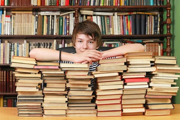 Boy and books Royalty Free Stock Photos