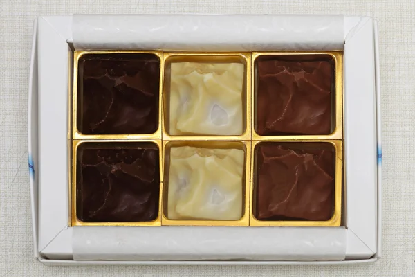 Três chocolates — Fotografia de Stock