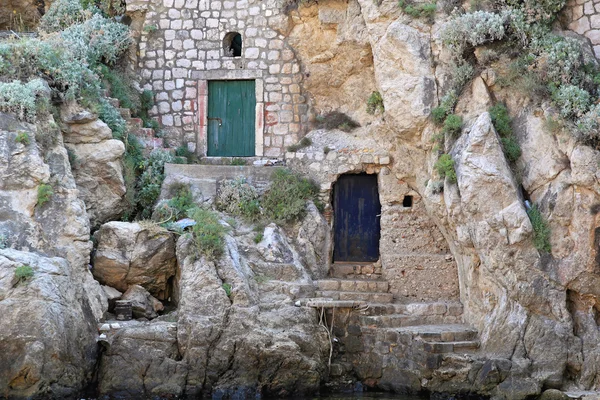 Houses in rock — Stock Photo, Image