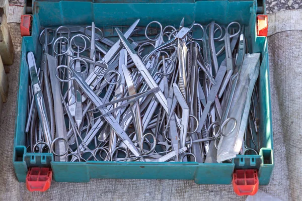 Many Used Surgical Scissors Tweezers Medical Instruments Box — Stockfoto