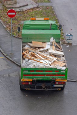 Construction Site Debris Loaded at Tipper Truck Transport