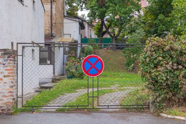 No Parking Sign at Fence Garden Way Entrance