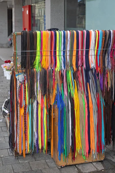 Many Colourful Style Long Laces Hanging Rack — Stock Photo, Image