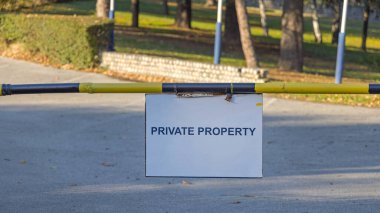 Private Property Sign Board at Closed Down Ramp clipart