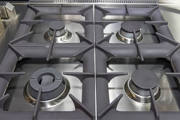 Gas Burning Stove Top Four Burners Hubs — Stock Photo, Image