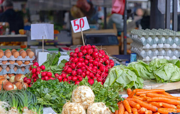 Red Radish Vegetables and Eggs at Farmers Market