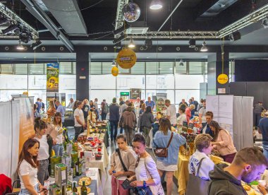 Belgrade, Serbia - May 07, 2022: People Crowd at Balkans Cheese Festival Event in Belgrade Youth Center Hall.