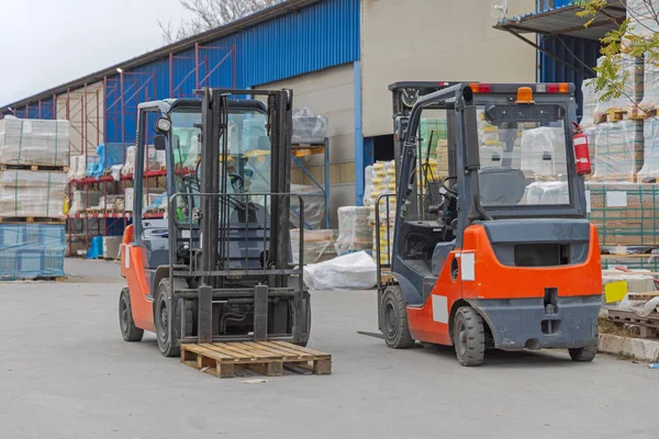 Two Forklift Machines Vehicles Open Warehouse Storage Transportation — Stok fotoğraf