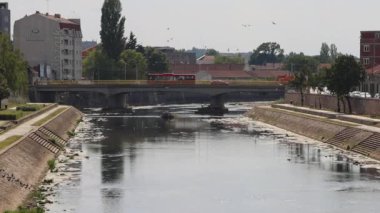 Nis, Serbia - August 04, 2022: River Nisava Flow Through City at Hot Summer Day.