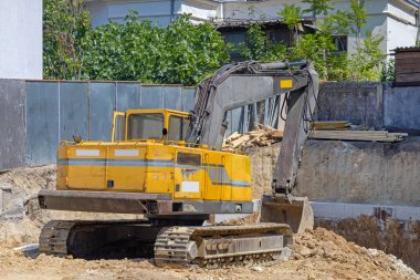 Crawler Excavator Digging at New Construction Site