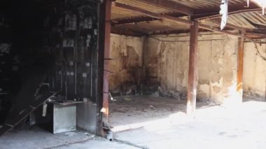 Shopping Mall Building Damaged Structure Clean Up After Inferno Fire pan