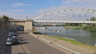 Szeged, Hungary - August 01, 2022: Downtown Bridge Belvarosi Over Tisza River at Hot Sunny Summer Day Panorama.