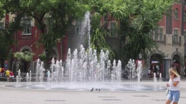 Subotica, Serbia - August 01, 2022: New Circular Water Fountain at Republic Square at Hot Summer Day.