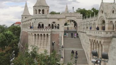Budapest, Hungary - July 31, 2022: Many Tourists Visiting Fisherman Bastion Halaszbastya Monuments Located Near Buda Castle in First District.