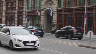 Budapest, Hungary - July 31, 2022: Cars Traffic at Szabad Sajto Street to Elisabeth Bridge in Capital City Sunday Summer Day.