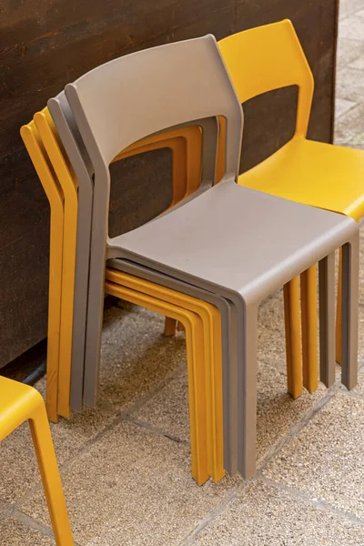 Stack Plastic Chairs Outdoor Terrace Patio Tiles — Stock fotografie