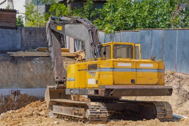 Crawler Excavator Digger at New Construction Site