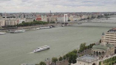 Tourist Boat Cruise Travel at River Danube Overcast Summer Day zoom