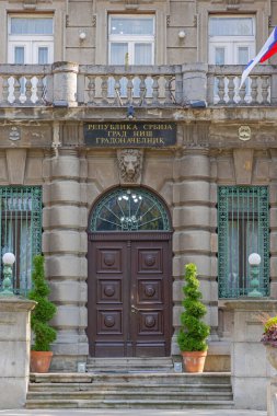 Nis, Serbia - August 04, 2022: Entrance to Mayor Office Town Hall Government Building in City Centre Summer Day.