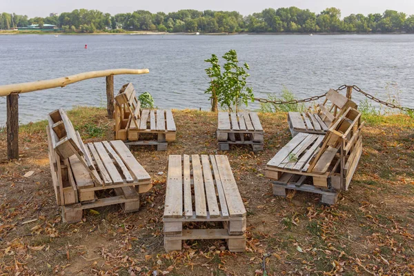 Wooden Cargo Pallets Furniture Set at Danube River Coast