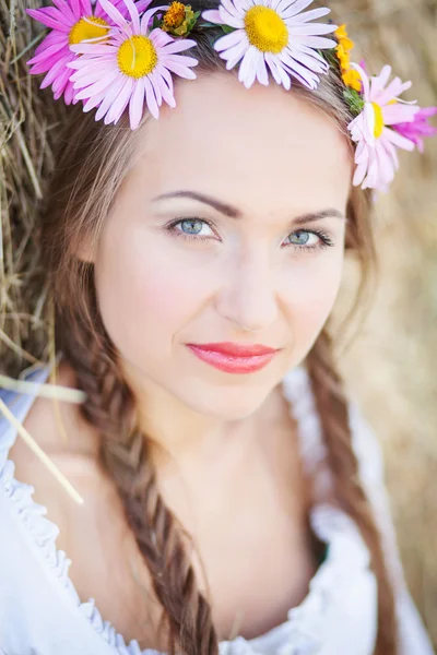 Girl with flower wreath outdoors Royalty Free Stock Images