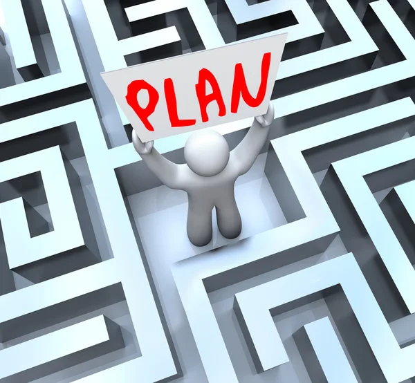 Planerar man med skylt i labyrint labyrint — Stockfoto