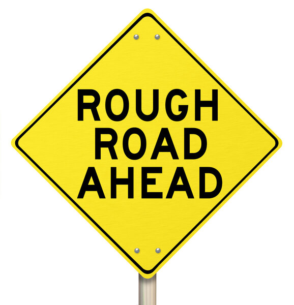 Yellow Warning Sign - Rough Road Ahead - Isolated