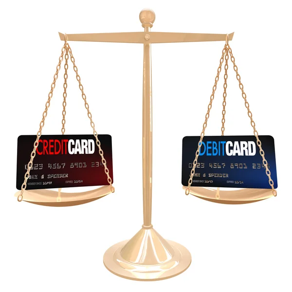 Credit Vs Debit Card - Weighing on Scale — Stock Photo, Image