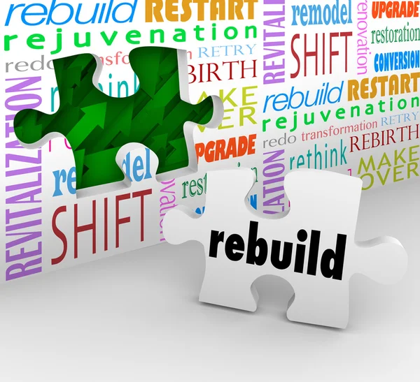 Rebuild Word Puzzle Piece Wall Reinvent New Start — Stock Photo, Image