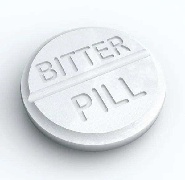 Palabras de Bitter Pill en una tableta blanca — Foto de Stock