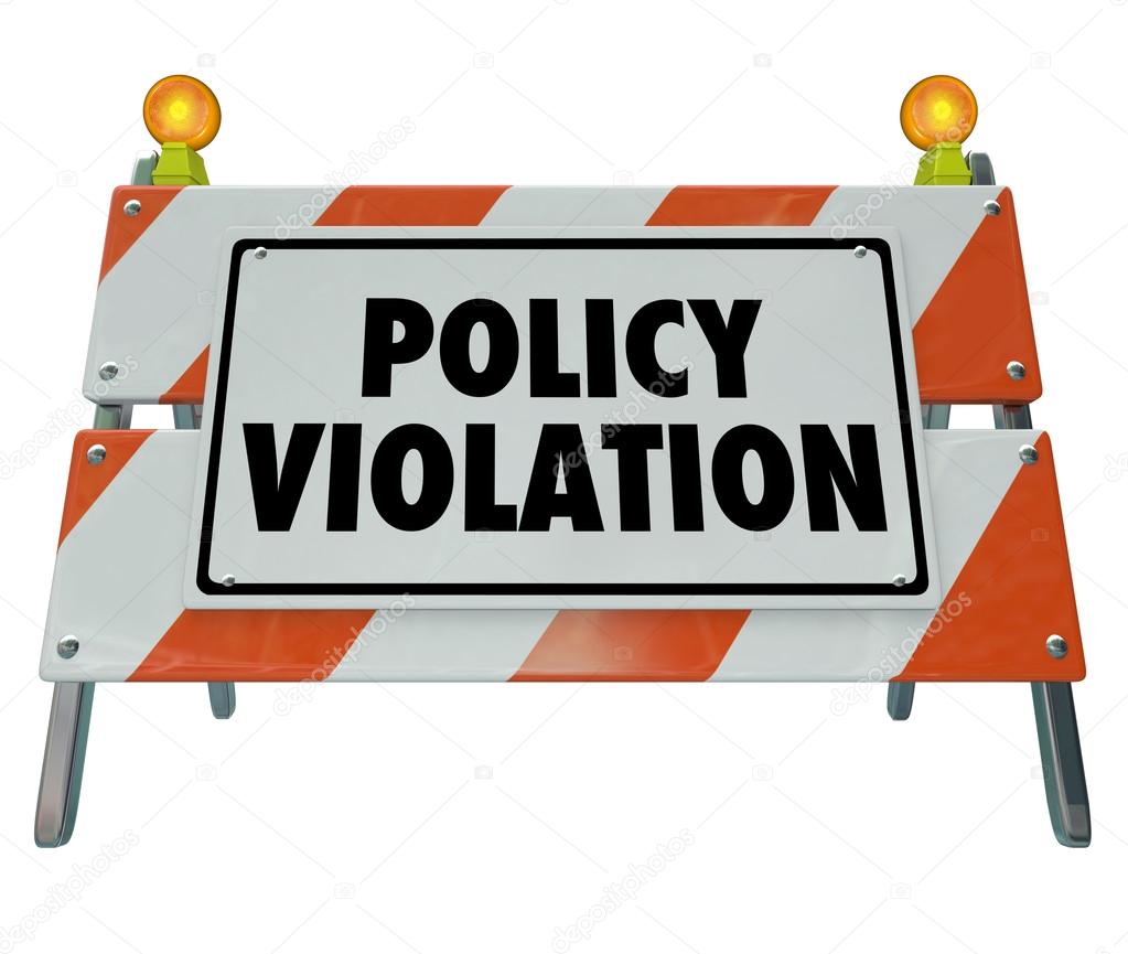 Policy Violation words on a road construction barrier