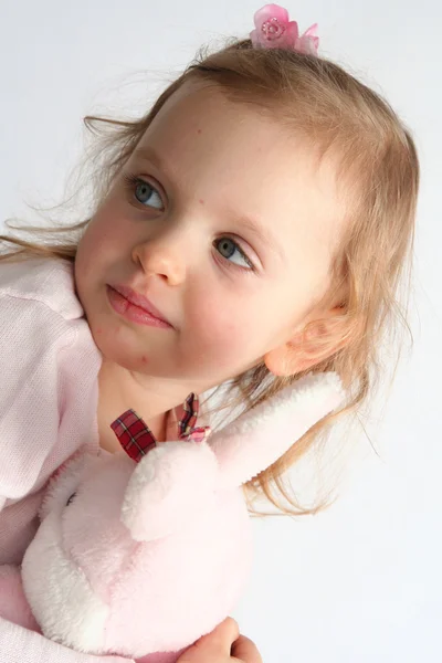 Baby girl and pink bunny — Stock Photo, Image