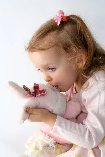 Baby girl and pink bunny — Stock Photo, Image