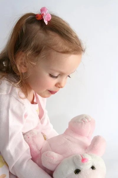 Baby girl and pink bunny — Stock Photo, Image