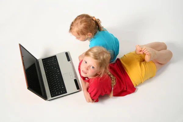 Playing on laptop — Stock Photo, Image