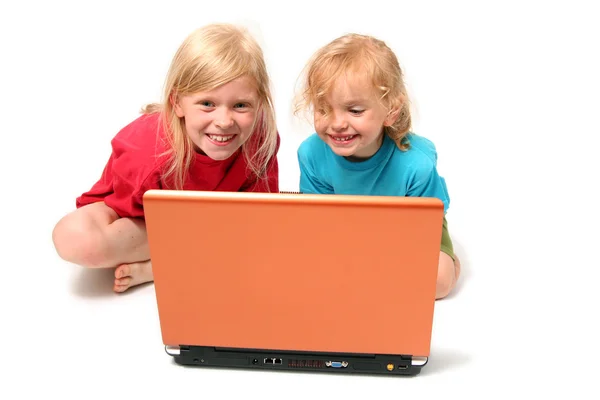 Playing on laptop — Stock Photo, Image