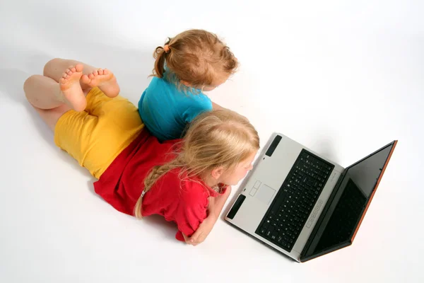 Playing on laptop — Stock Photo, Image