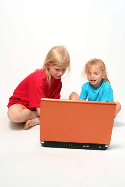 Playing on laptop — Stock Photo, Image