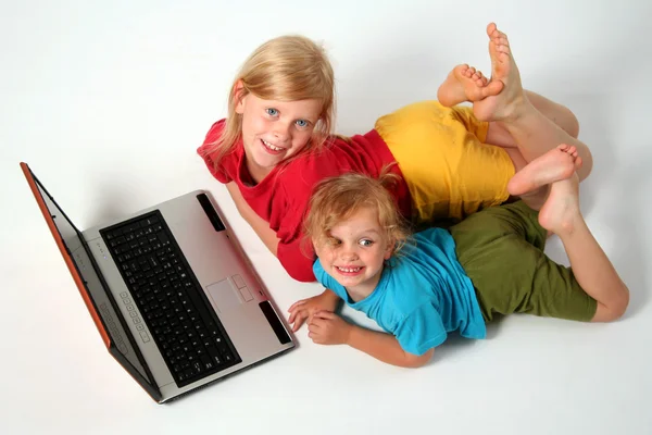 Playing on laptop — Stock Photo, Image